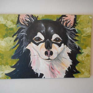 May include: A painting of a black and white chihuahua with brown eyes, looking directly at the viewer. The dog is painted on a green background with white clouds.