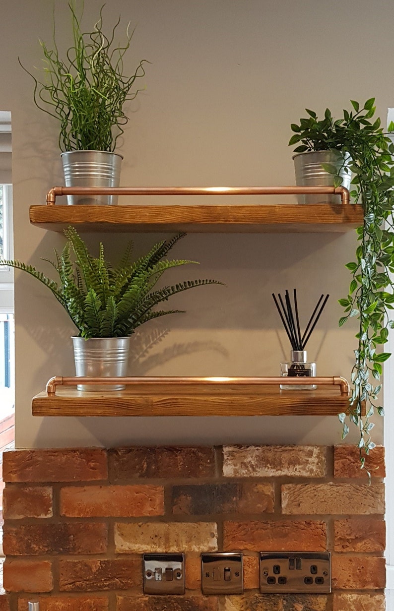 Rustic Wooden Floating Shelf with Copper Pipe Rail