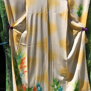 Japanese kimono, pale yellow & pale pink fabric w/printed colourful spring flowers a bit of gold embroidery excellent condition, vintage image 1