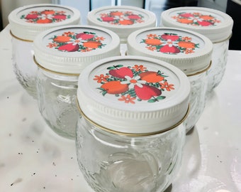 6 Vtg. Kerr Fruit & Flower Jelly Canning Jars Embossed 70s 60s Tin Lids US 8oz