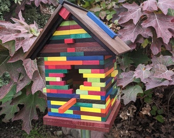 Birdhouse made of oblong stained children&#39;s blocks