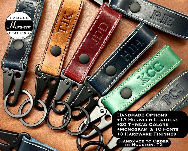 May include: A collection of personalized leather keychains in various colors, including tan, red, green, and navy. Each keychain features embossed initials and a black metal clasp. The image also includes text that says "Famous Horween Leathers" and "Handmade to Order in Houston, TX."
