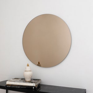 Miroir rond contemporain sans cadre teinté bronze