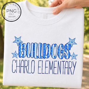 May include: White sweatshirt with the word "BULLDOGS" in blue and white striped letters, with blue stars. Below the word "BULLDOGS" is the text "CHARLO ELEMENTARY" in blue. The sweatshirt is held up by a hand.