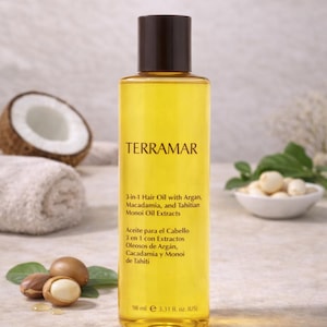 May include: A bottle of TERRAMAR 3-in-1 Hair Oil with Argan, Macadamia, and Tahitian Monoi Oil Extracts. The yellow liquid is in a clear bottle with a dark brown cap. The bottle contains 3.31 fl. oz. of product.