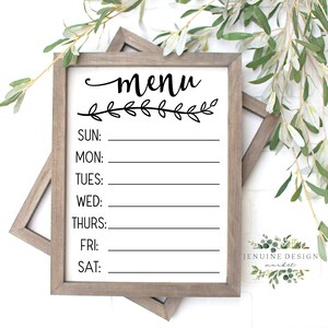 May include: A white framed menu board with a black handwritten word "menu" and a black floral design above a list of days of the week: Sunday, Monday, Tuesday, Wednesday, Thursday, Friday, and Saturday. Each day has a blank line for writing.