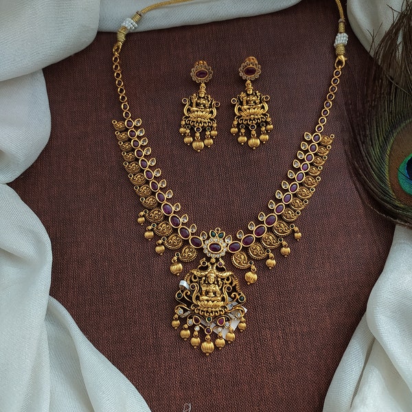 Divine Traditional Antique Lakshmi Necklace Set with Kemp Stones, Mango Detail, and Elegant Golden Ball Drops - Matching Earrings"