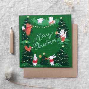 Vrolijke kerstwenskaart - konijnen, eekhoorn, vos, uil, kat