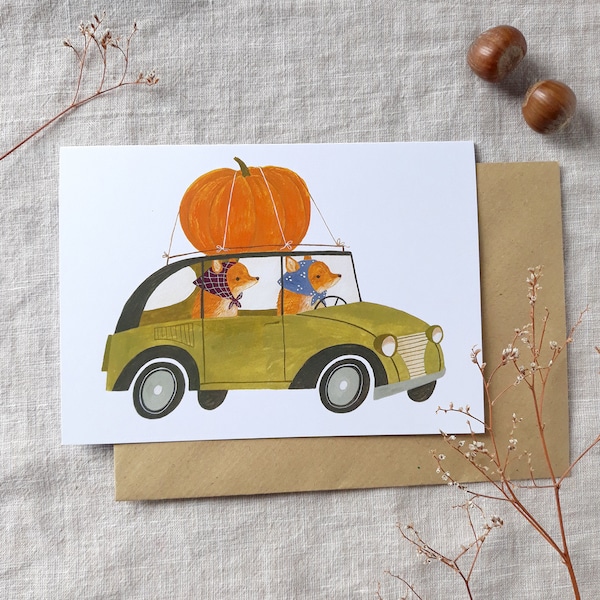 Greeting card Pumpkin - foxes in car