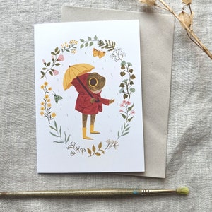 Greeting card frog with umbrella