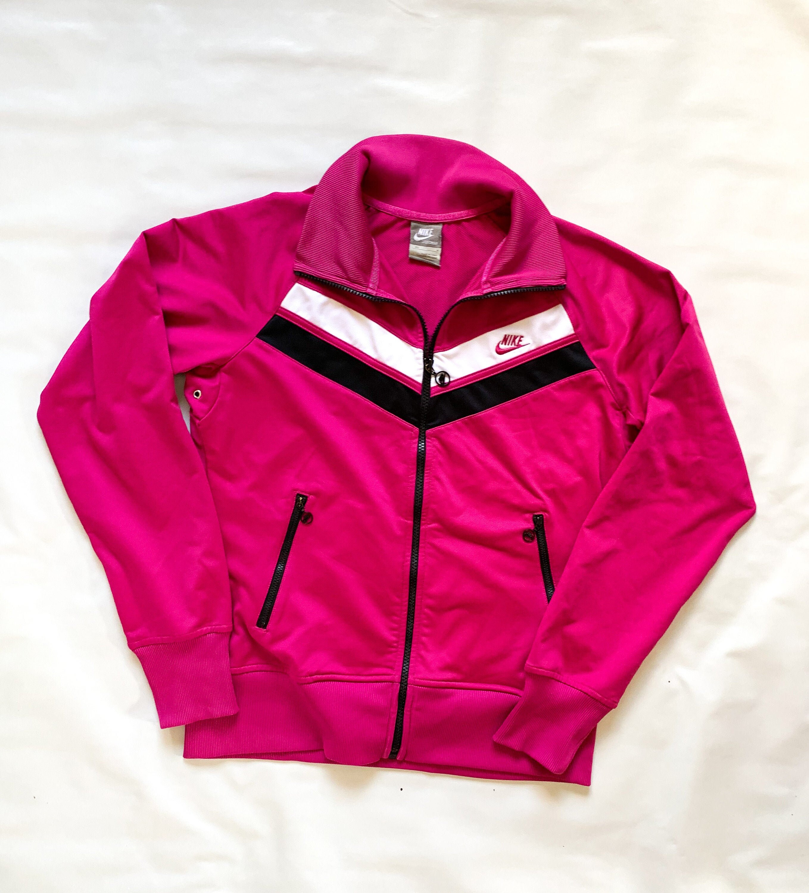 hot pink and black nike shirt