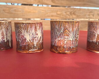 Handbuilt espresso cup made from ceramic clay with textured pottery design — handmade artisan coffee cup perfect for espresso lovers.