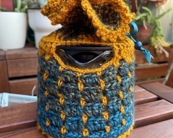 Teapot with handmade crochet cover