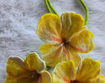 Three handmade felt flowers