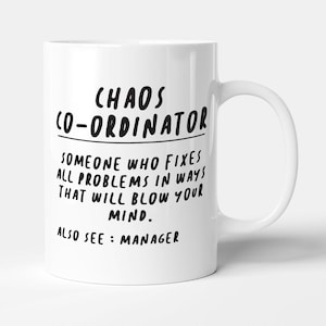 May include: White ceramic mug with the words "CHAOS CO-ORDINATOR" in black, and a definition. The definition reads: "SOMEONE WHO FIXES ALL PROBLEMS IN WAYS THAT WILL BLOW YOUR MIND. ALSO SEE: MANAGER."