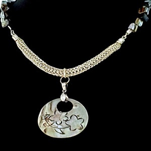 Iridescent MOP Necklace: Handmade Silver Knitted Bib, Shell Pendant