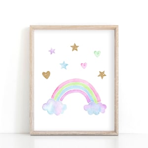 May include: A framed print with a watercolor rainbow with clouds and gold glitter stars and hearts on a white background.