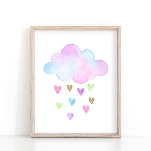 May include: A framed watercolor print of a pastel pink, blue, and purple cloud with a rain of colorful glitter hearts.