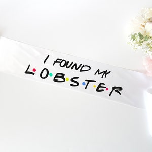 I found my Lobster bachelorette sash with pin- Bachelorette friends theme sash