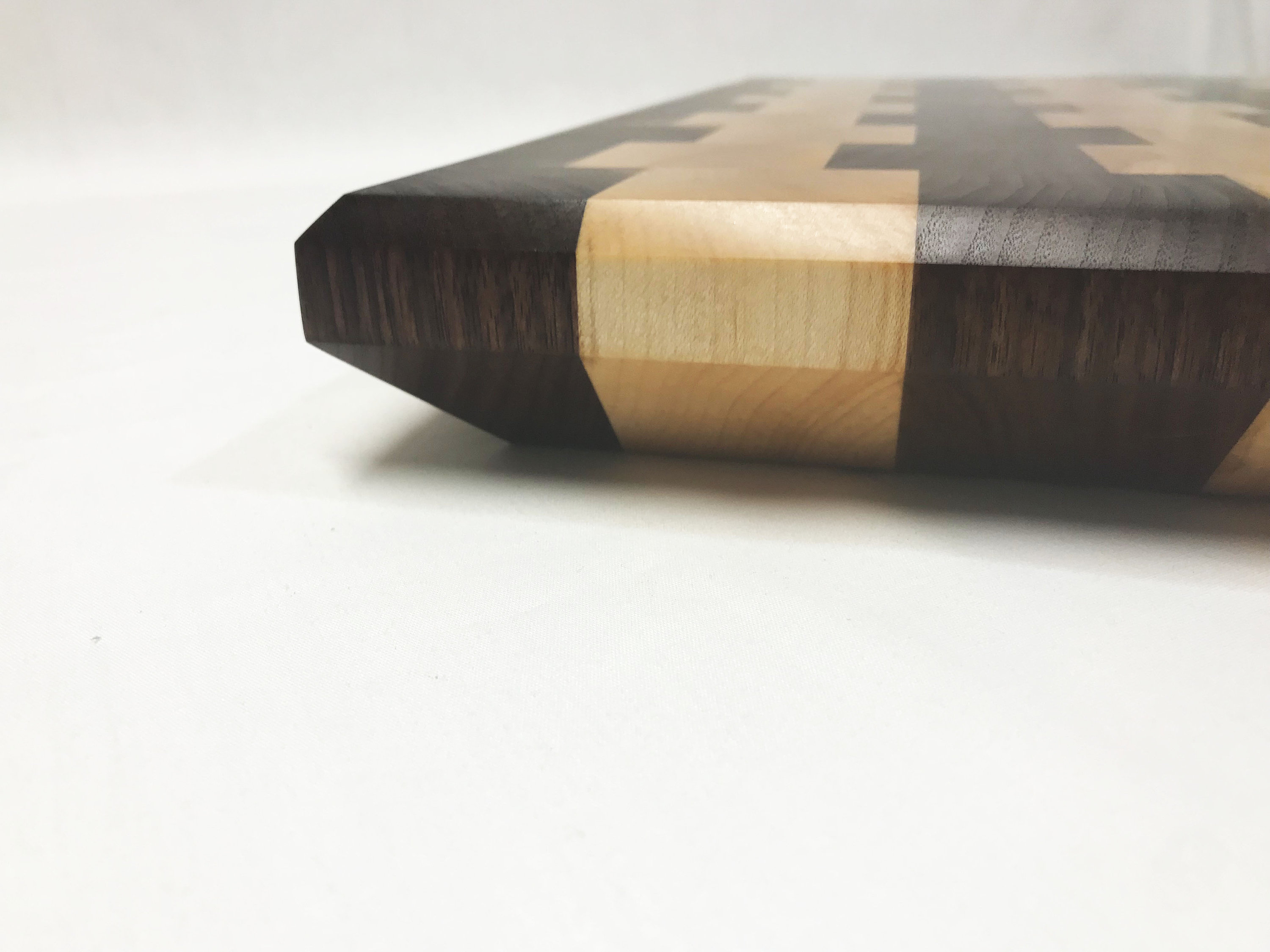 African Padauk and Maple wood end grain cutting board. 15” x 12” x 1.25”
