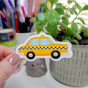 Adesivo de táxi de Nova York | Adesivo de táxi de Nova York, adesivo de viagem fofo, táxi amarelo, adesivo de viagem de Nova York, adesivo de mala, adesivo da Big Apple