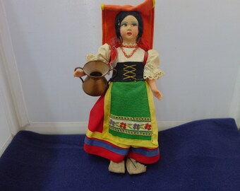 Really pretty little Dutch girl vintage souvenir precious doll in traditional dress carry a little water bucket in great vintage shape