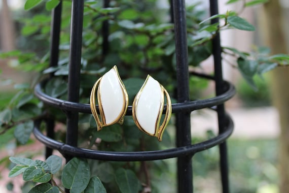 Vintage Monet White and Gold Enamel Leaf Earrings - image 1