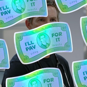 May include: Holographic stickers resembling £50 banknotes, with a portrait and the phrases "I'll Pay" and "For It." The stickers are green and blue, with the text "Official Treasure of The Pitt."