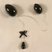 Insertable Black Double Penetrating Eggs with Silver Chain and Bow