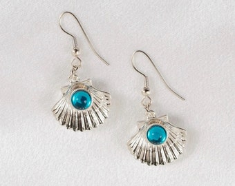 Silver Ocean Seashell Dangle Earrings with Blue Gem