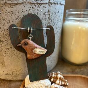 handmade bird pendant