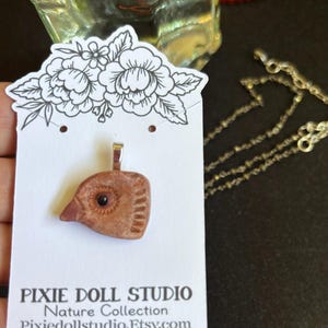 handmade terracotta bird charm