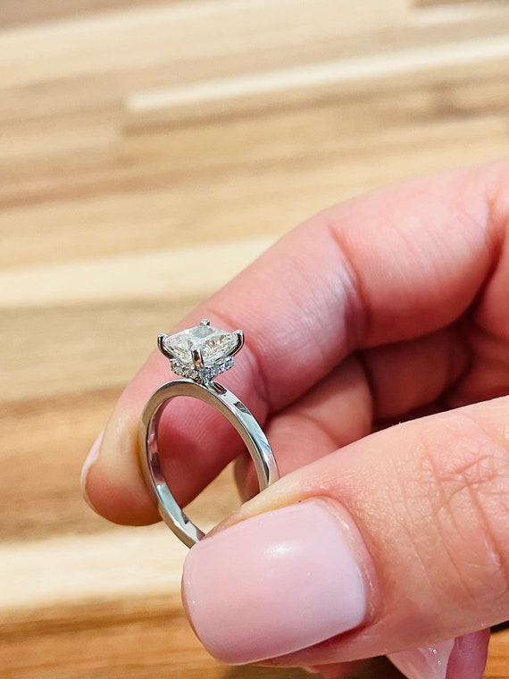 Cushion cut hidden halo on sale engagement ring