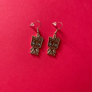 Cartoon Tree stump guy earrings