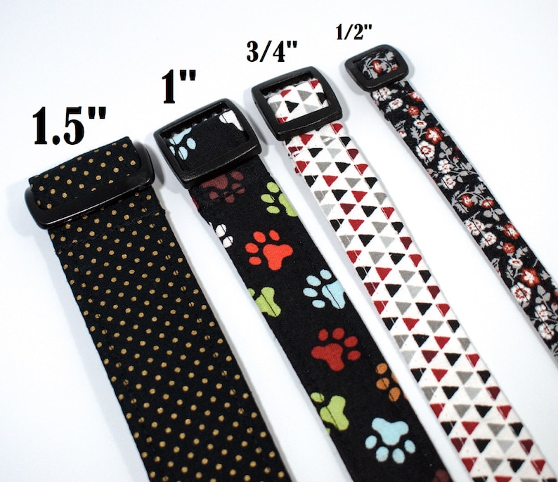 May include: Five fabric dog collars in different patterns and sizes, ranging from 1.27 cm to 3.81 cm wide. The collars are black with various patterns, including polka dots, paw prints, and geometric shapes.
