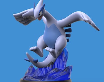 May include: A blue and white Pokemon figurine of a legendary bird Pokemon, standing on a blue wave base. The Pokemon has a long tail and wings spread out.