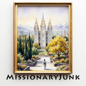 Puede incluir: Impresión en acuarela enmarcada de un templo con múltiples agujas, sobre un fondo de montañas y un horizonte urbano. La obra de arte presenta a una persona caminando por un camino hacia el templo. El marco es dorado y el texto "MISSIONARYJUNK" está en la parte inferior.