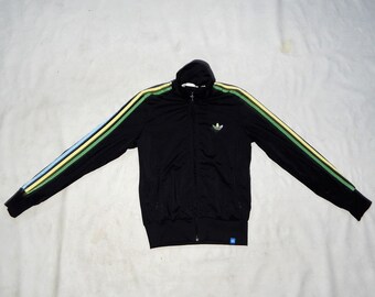 Black adidas jacket with yellow stripes clearance