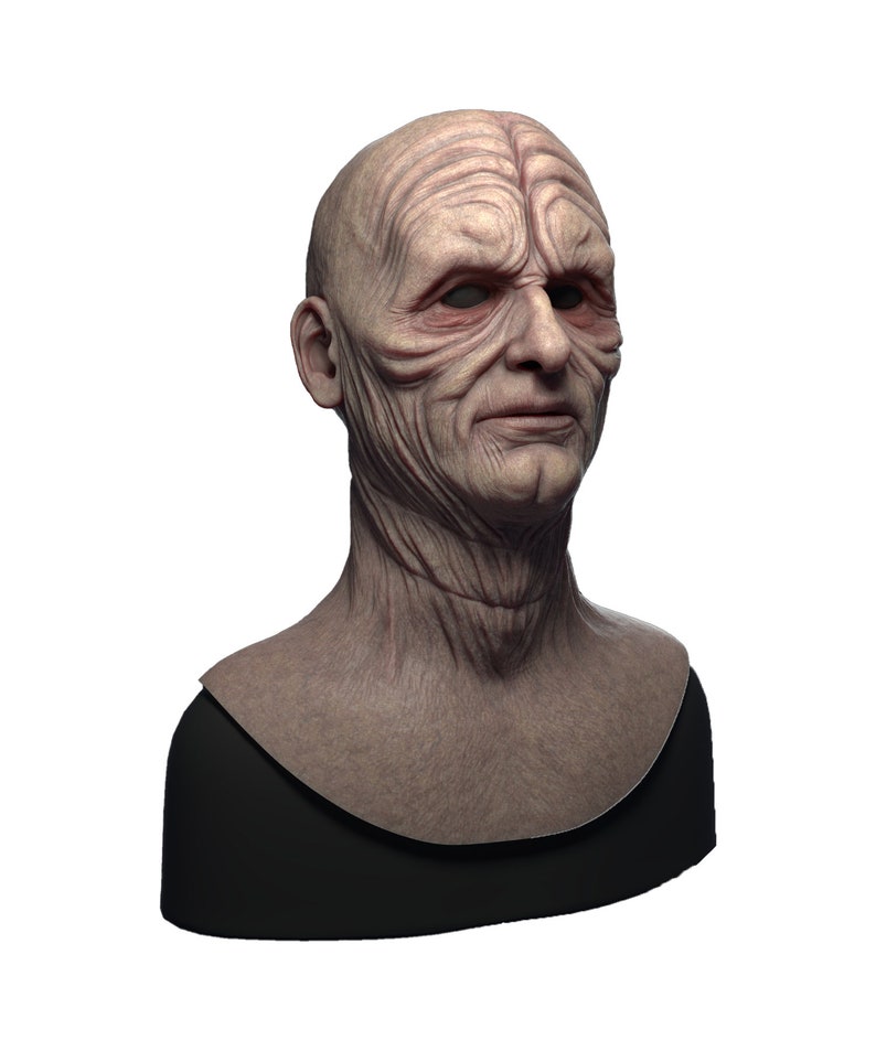 May include: A detailed bust sculpture of a humanoid figure with a wrinkled face and a bald head. The sculpture is made of a light brown material and is set against a white background.