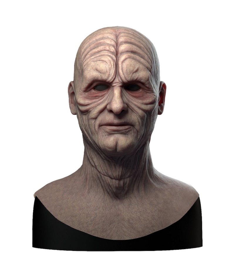 May include: A detailed bust of a fictional character with wrinkled skin and a serious expression. The bust is made of a light brown material and is displayed on a black base.