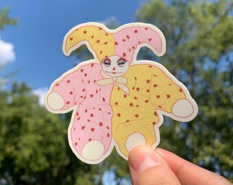 small but knowing clown doll