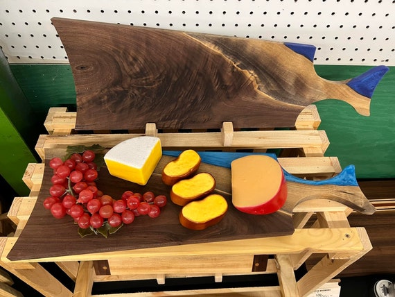 Live edge walnut and epoxy charcuterie board