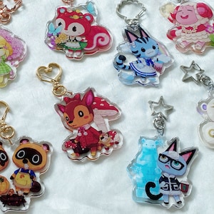 Llavero ACNH de temporada de animales Fauna Isabelle Timmy&Tommy Poppy Lolly Raymond Marshal Dom