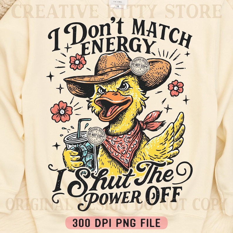 May include: Cream-colored sweatshirt with a graphic of a yellow duck wearing a cowboy hat and a red bandana, holding a drink. Text reads "I Don't Match Energy" and "I Shut The Power Off."