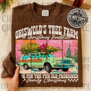 May include: Brown sweatshirt with a graphic of a green station wagon carrying a Christmas tree. The text reads "GRISWOLD'S TREE FARM a christmas tradition SINCE 1989" and "MAKE FOR THE FUN OLD FASHIONED Family Christmas". The design includes pink and green elements.