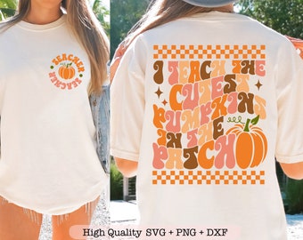 May include: White t-shirt with a pumpkin design and the text "Teacher" in a circle on the front. The back of the shirt has a checkered pattern and the text "I teach the cutest pumpkins in the patch" in a retro font.