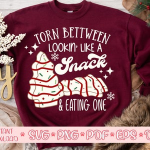 Torn Between Lookin&#39; Like A Snack & Eating One Christmas Tree Cakes svg, Christmas Tree Cake svg, Retro Christmas png, Christmas Shirt svg