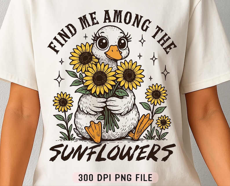 May include: A white t-shirt with a graphic of a duck surrounded by sunflowers. The text "Find me among the sunflowers" is printed above the graphic and "300 DPI PNG FILE" is printed below the graphic.