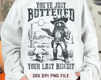 You've Just Buttered Your Last Biscuit PNG, Sassy Southern Humor png, Snarky Retro Raccoon Cowboy png, Trendy Animal Shirt png