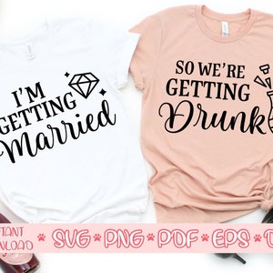 May include: Two white t-shirts with black text and graphics. The first shirt says "I'm Getting Married" with a diamond graphic. The second shirt says "So We're Getting Drunk" with a champagne bottle graphic.